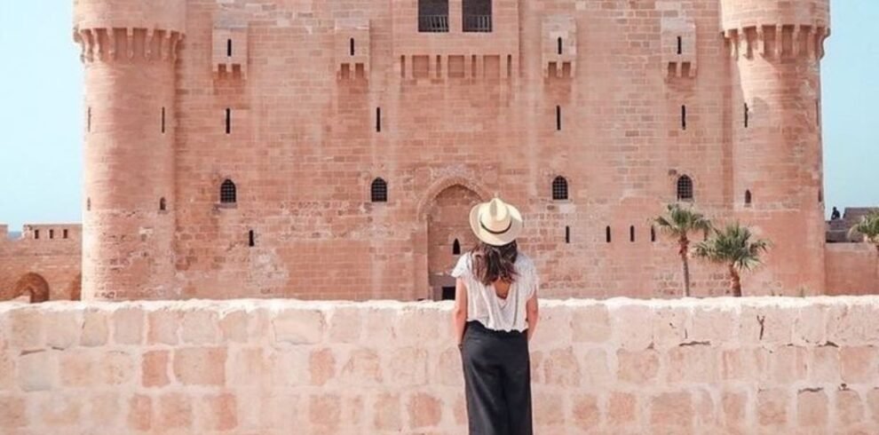 Woman Admiring a Historic Fortress Woman Admiring a Historic Fortress