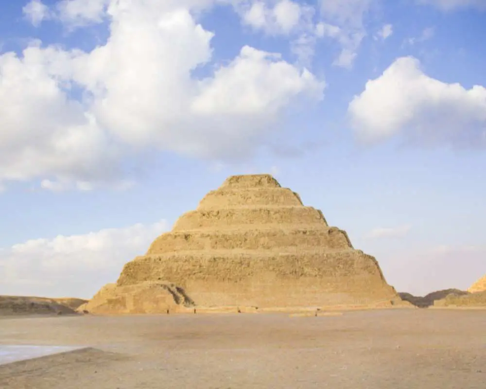 The Step Pyramid of Djoser at Saqqara during Egypt trips to the Pyramids, showcasing the world's oldest stone monument