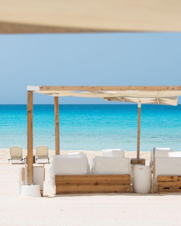 Marsa Matrouh Aqua Heneish beach crystal clear shallow turquoise water and white sand summer Egypt