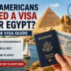 Do Americans Need a Visa for Egypt? American traveler holding a U.S. passport and Egypt tourist visa with the Pyramids of Giza and the Sphinx in the background, illustrating the 2026 Egypt visa requirements, visa fees, application process, and entry rules for U.S. citizens.