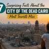 City of the Dead Cairo historic district at sunset with Islamic architecture and Cairo skyline