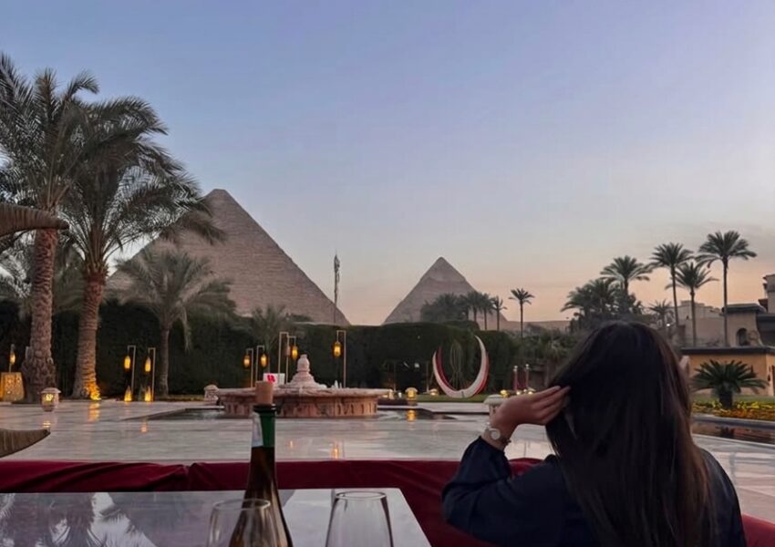 Luxury Egypt Tours featuring a five-star Nile cruise sailing at sunset