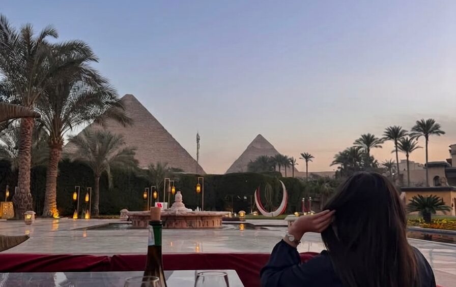 Luxury Egypt Tours featuring a five-star Nile cruise sailing at sunset