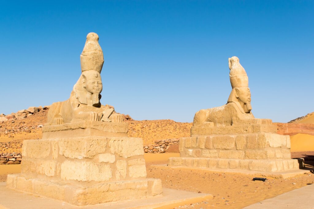 Sandstone avenue of royal sphinxes leading to the Ramesses II Temple of Wadi el-Seboua on the shores of Lake Nasser